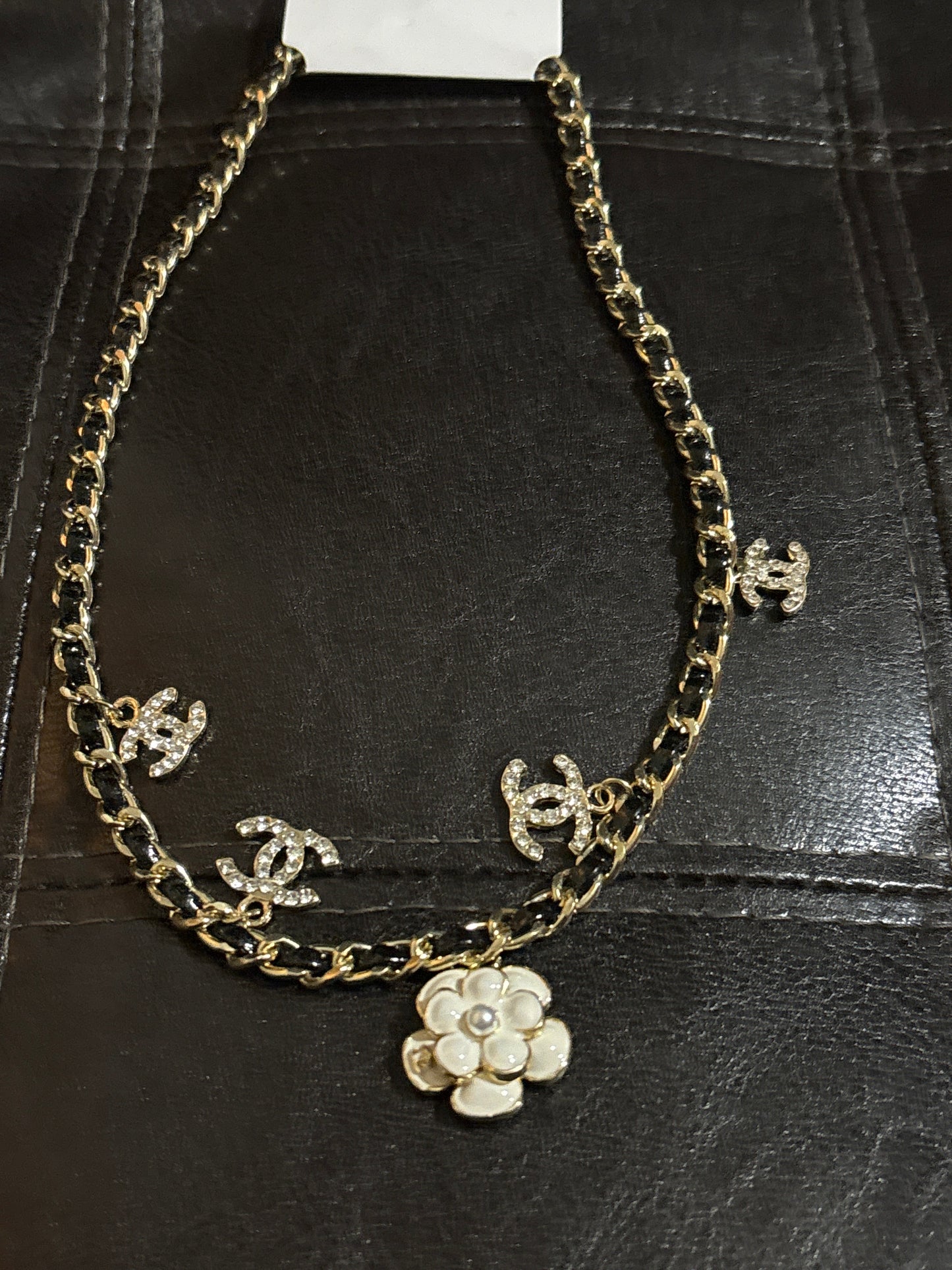 🌸 Luxury Gold-Tone Black Leather Woven CC Crystal Charm & Camellia Flower Statement Necklace — Style #1654 💎✨