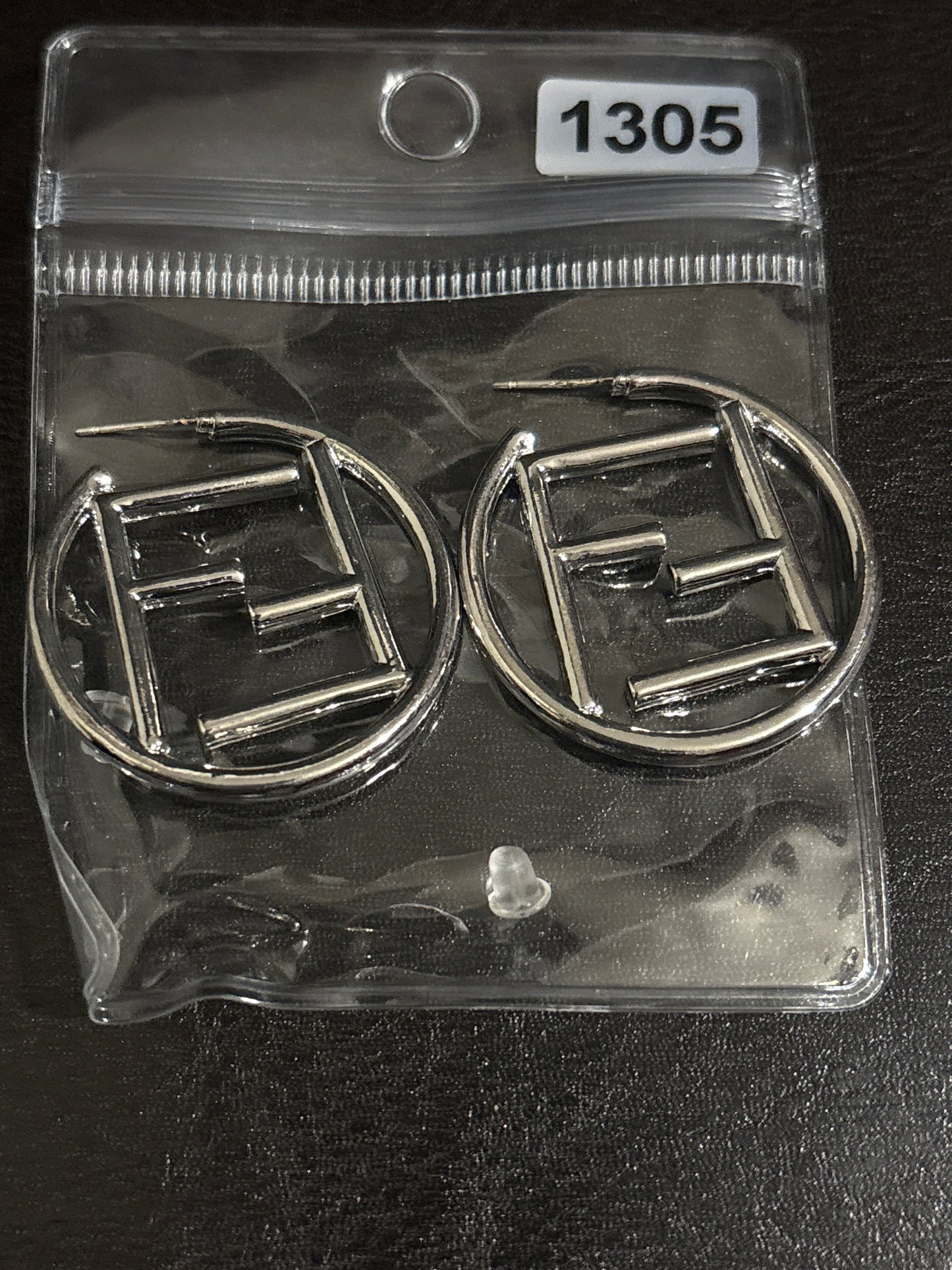 Luxury Silver-Tone Double-F Monogram Circle Hoop Earrings with Open Logo Frame 🪨💰✨