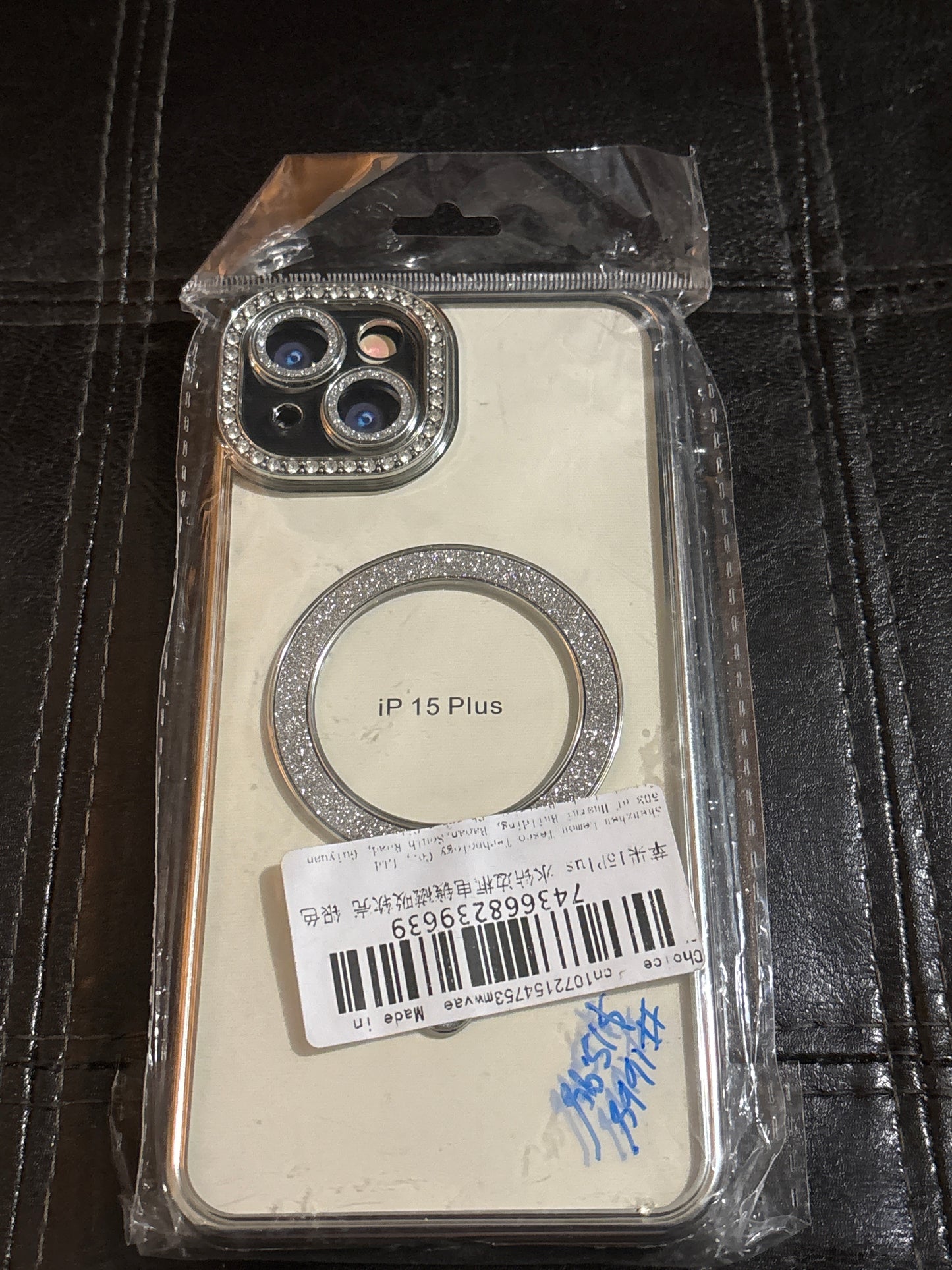 Silver electroplated clear bling rhinestone MagSafe iPhone 15 Plus case with crystal camera lens frame and glitter MagSafe ring showing iP 15 Plus label #1668