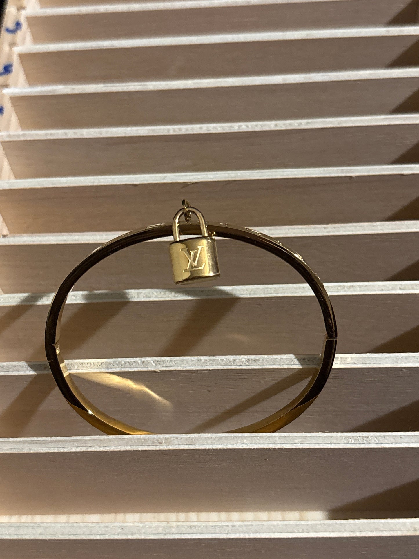 Luxury Gold-Tone Monogram Flower Bangle Bracelet with Miniature Padlock Charm 🔐💰✨