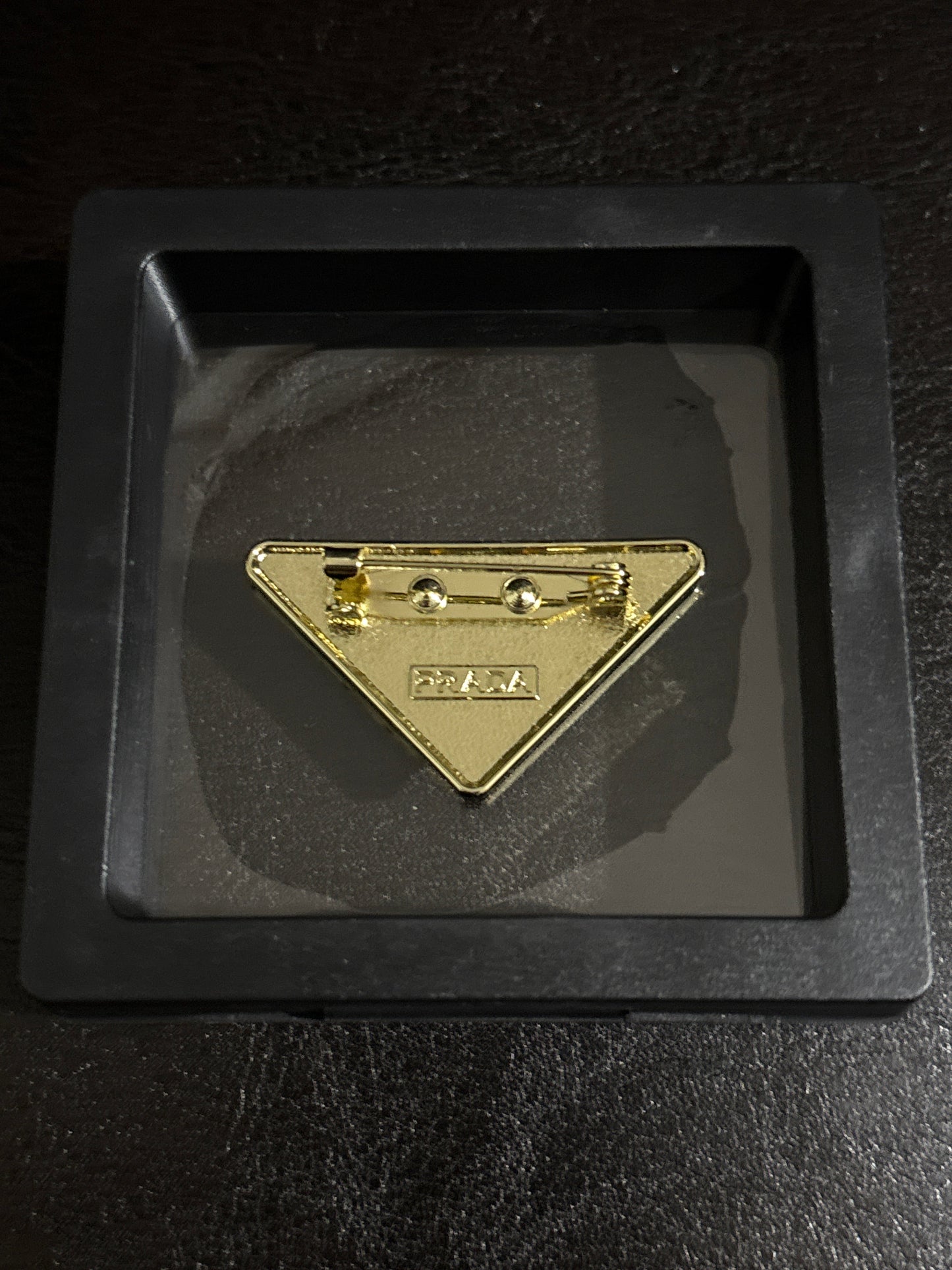 Luxury Italian Fashion-Inspired Black Enamel Inverted Triangle Brooch with Gold-Tone Lettering & Crest in Shadow Box 🖤💰✨
