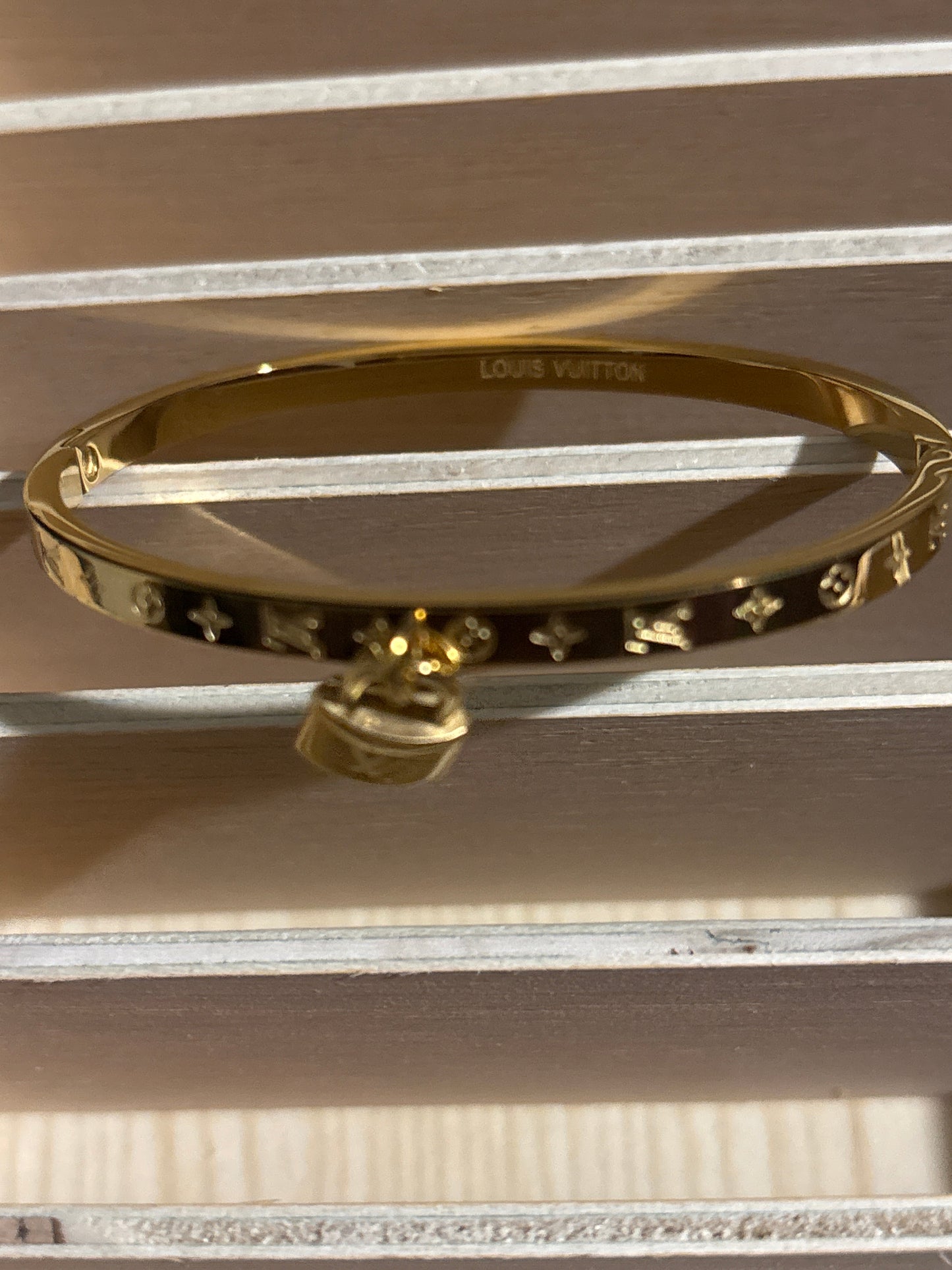 Luxury Gold-Tone Monogram Flower Bangle Bracelet with Miniature Padlock Charm 🔐💰✨