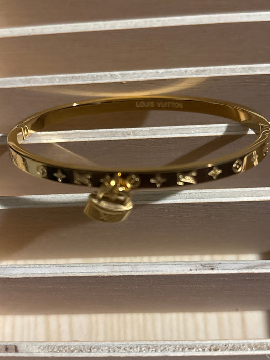 Luxury Gold-Tone Monogram Flower Bangle Bracelet with Miniature Padlock Charm 🔐💰✨