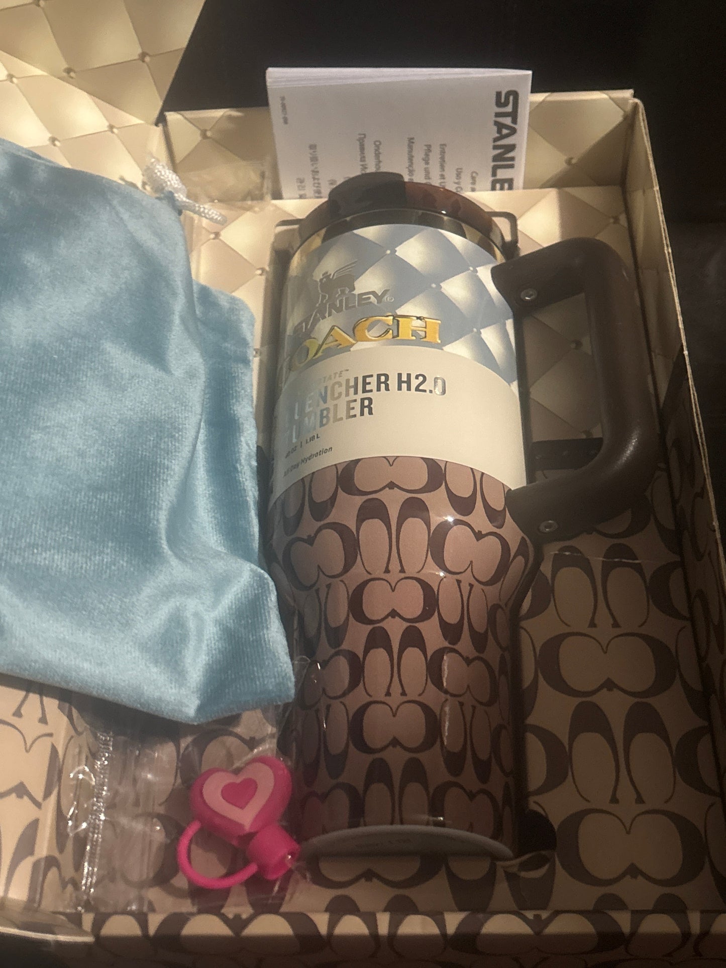 Stanley x Coach Brown Signature Monogram Quencher Tumbler 40oz angle view in box